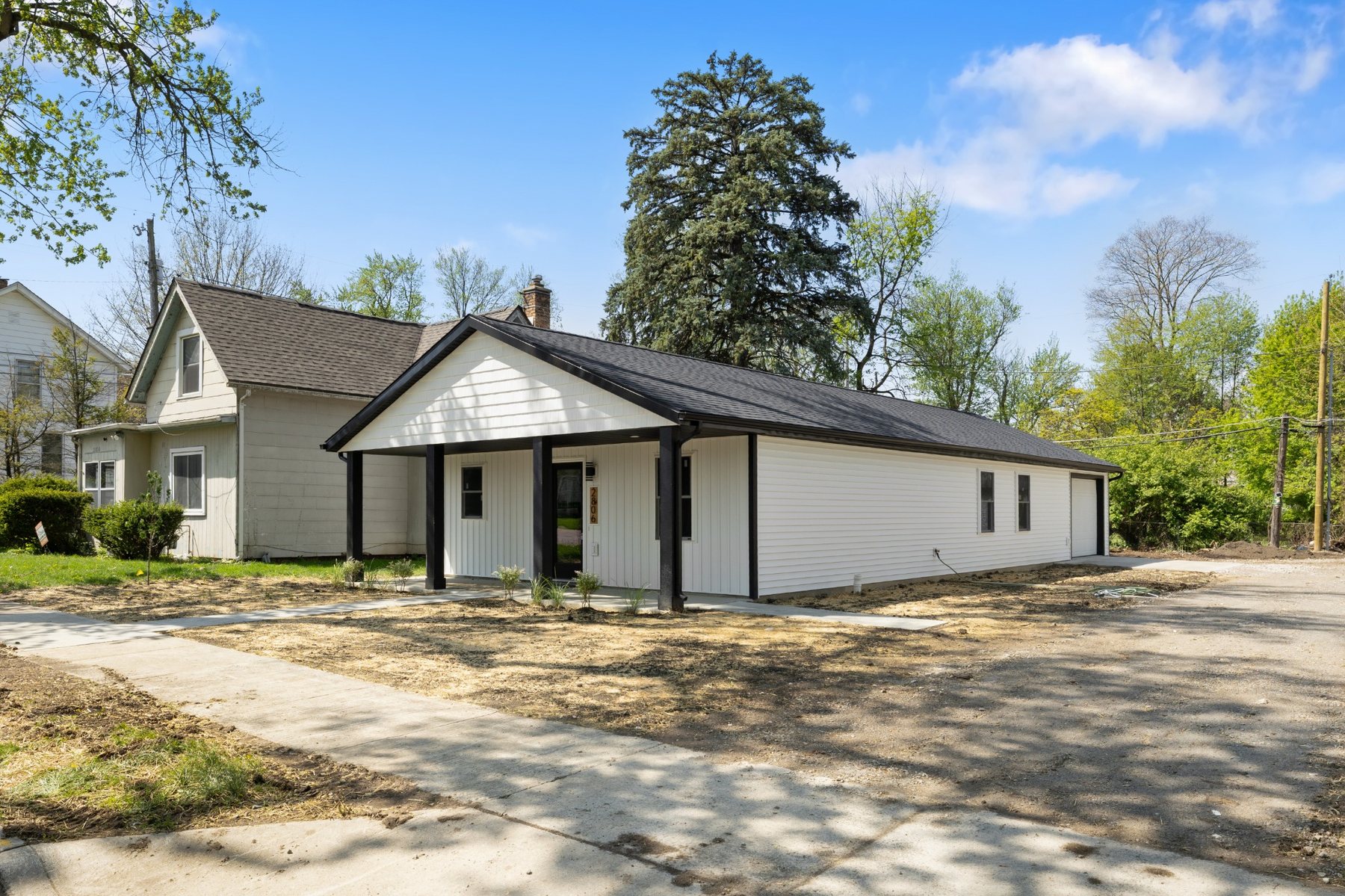 Completed white and black infill home